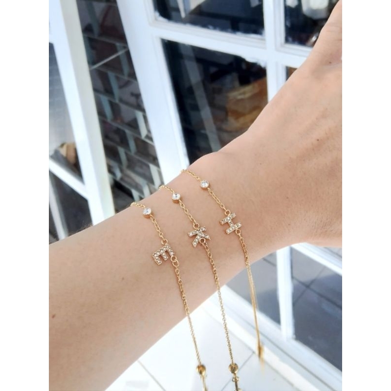 U7 gelang kait lobster serut huruf titanium asli cap 750/17k