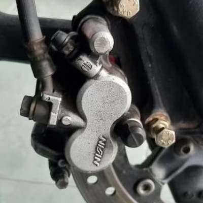 kaliper depan original tiger revo