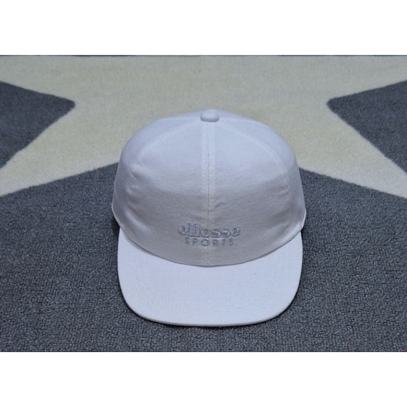 topi putih ellesse sport unik bekas preloved