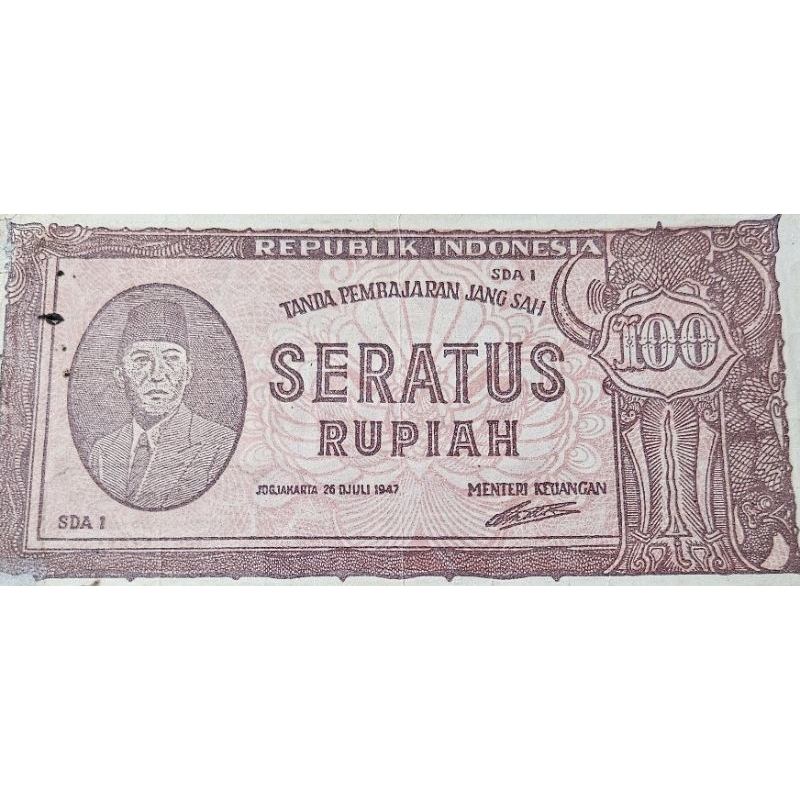 Uang Kuno negara Indonesia 100 rupiah tahun 1947 coklat ORI (Oeang Republik Indonesia) Kondisi renya