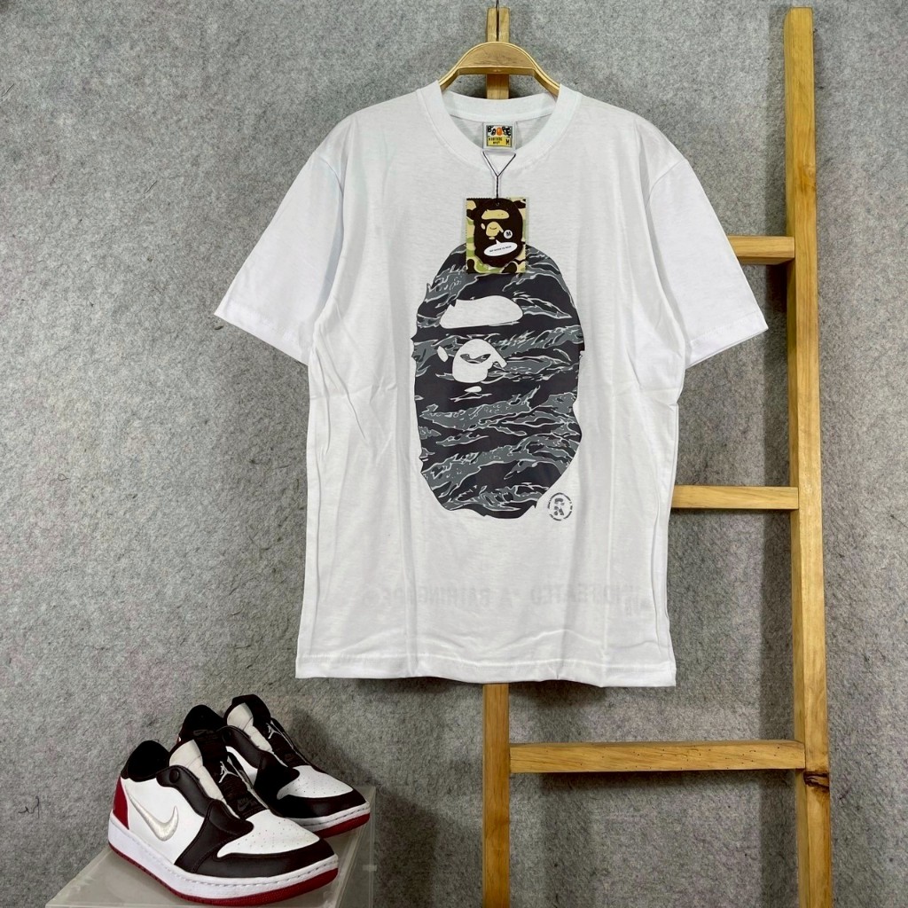 BAJU KAOS T-SHIRT BAPE A BATHING APE X UNDEFEATED HEAD LOGO CAMO TIGER ON WHITE