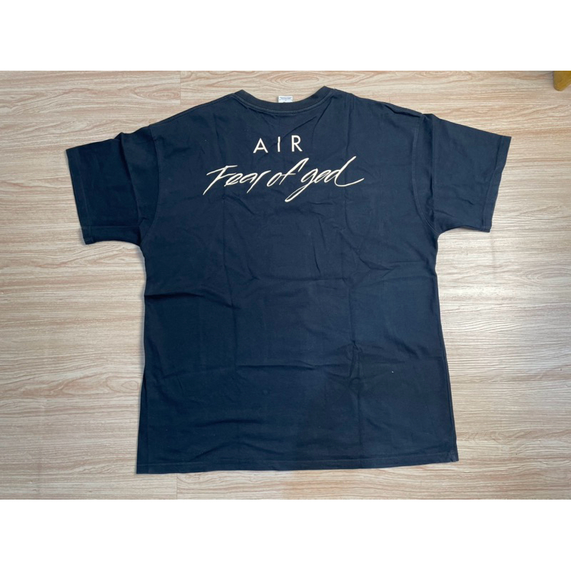 kaos merk Nike fear of god