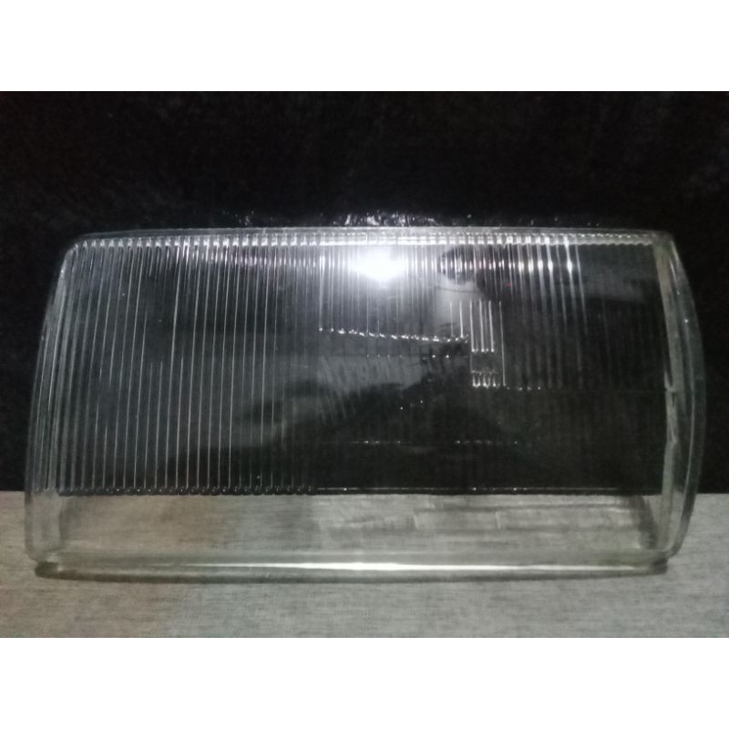 Mika kaca lampu depan / mika kaca headlamp depan Mercedes-Benz W124 Boxer original bagian kiri