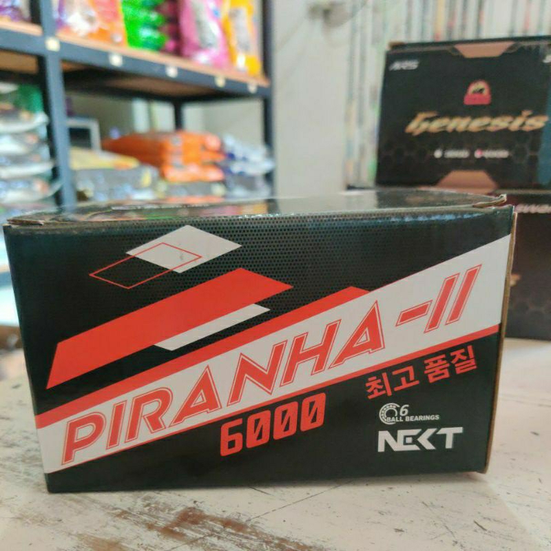 REEL PANCING IKAN SPINNING NEXT PIRANHA II