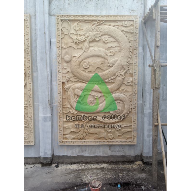 ukiran batu alam relief naga