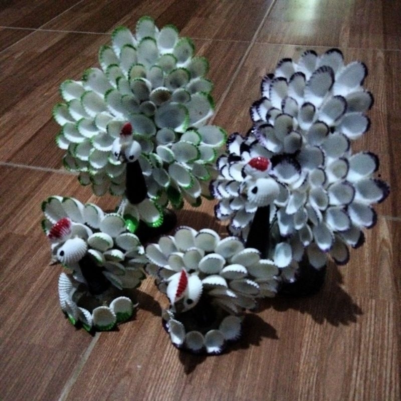 MAINAN KERANG BURUNG MERAK