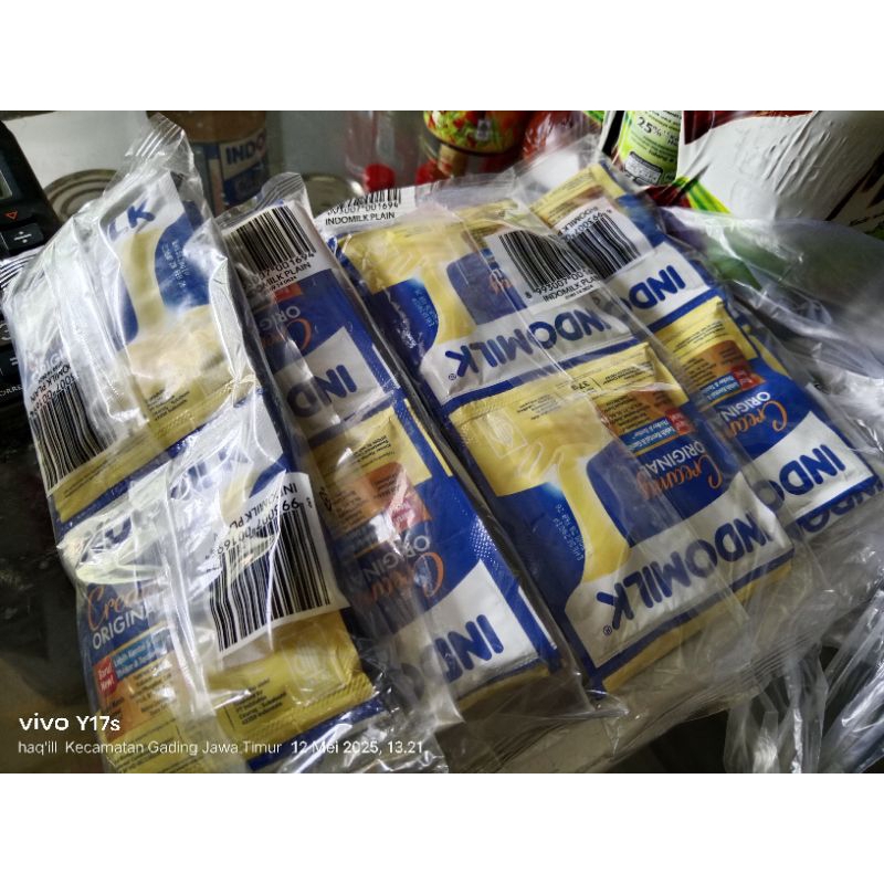 

Indomilk saset coklat/ putih