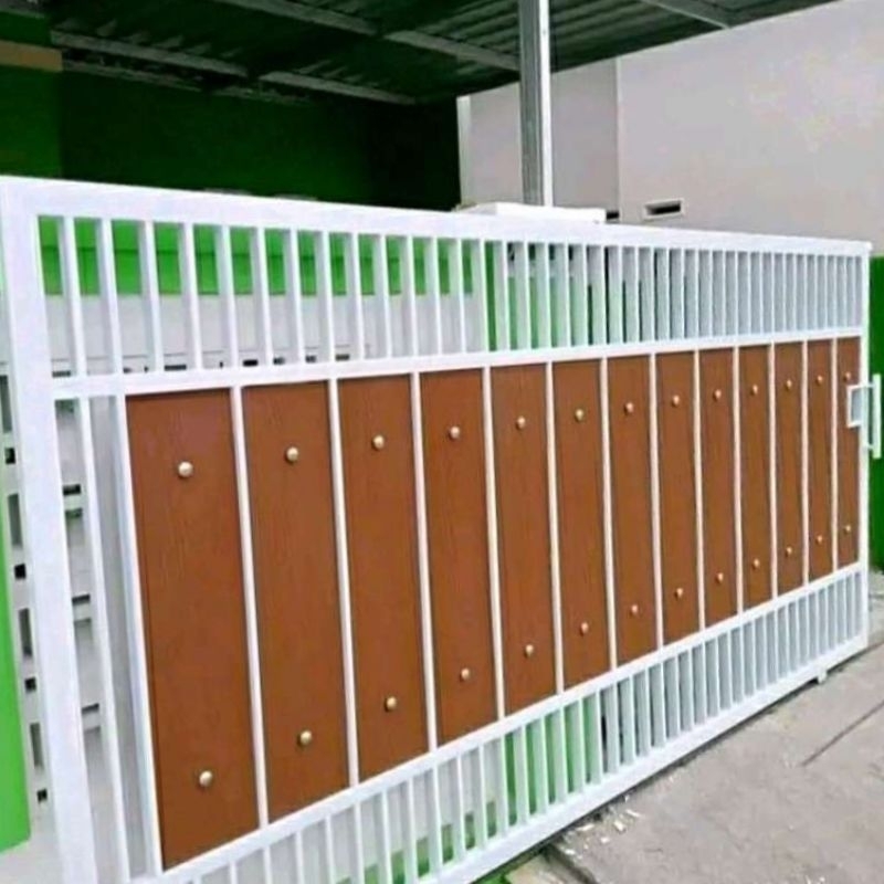 pagar rumah model lisplang grc motif kayu