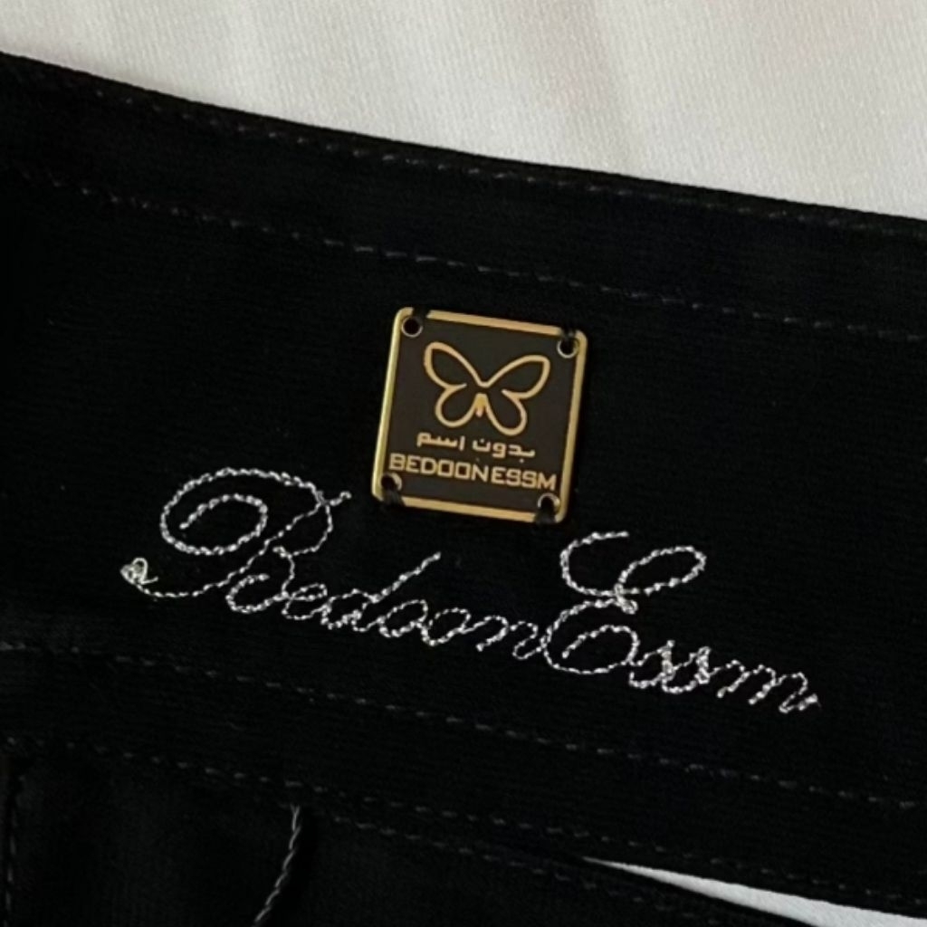 

label hijab bedoonessm/label plat besi