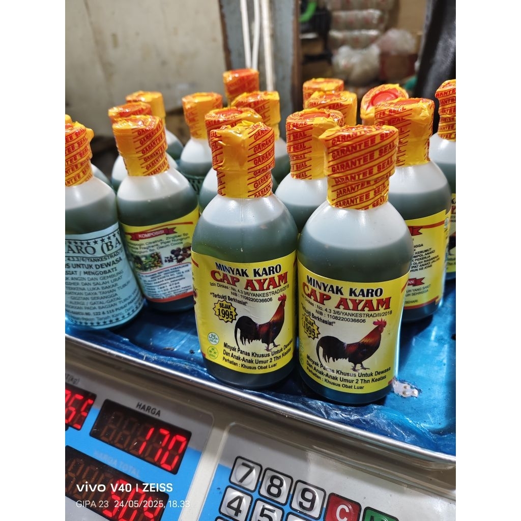 Minyak Karo / Minyak urut karo cap Ayam 200ml