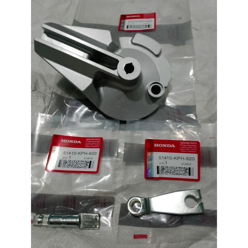 TUTUP KAMPAS REM BELAKANG TUTUP TROMOL BELAKANG KPH HONDA KARISMA/ SUPRA X 125 ORI MOTOR