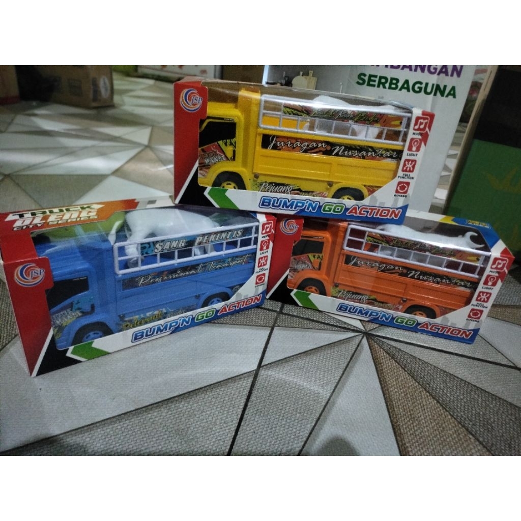 mainan truk oleng bonus sapi