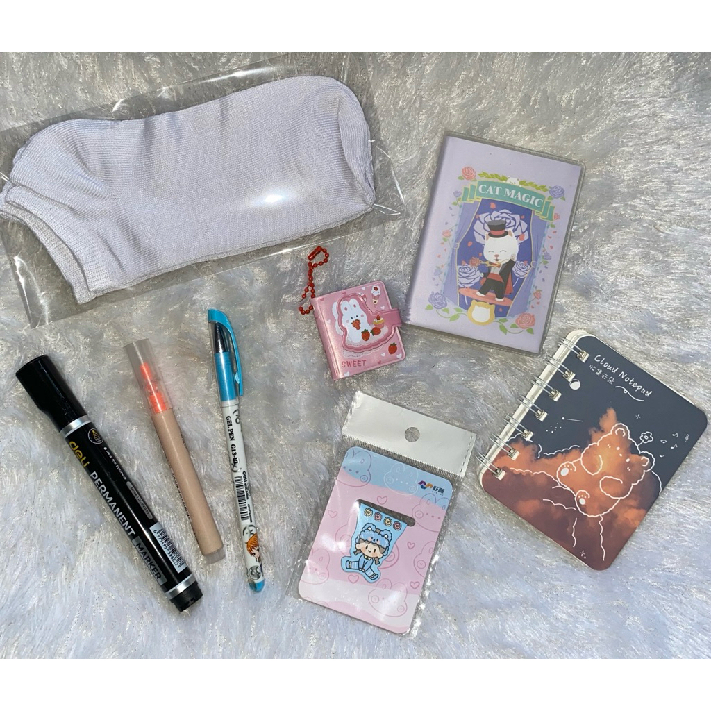 

notebook kaos kaki spidol pulpen