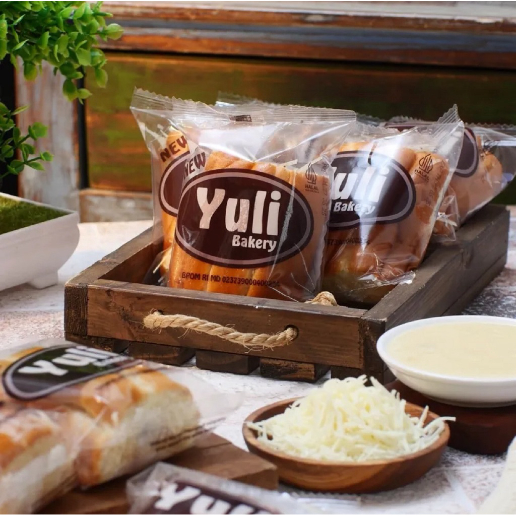 

Roti Yuli Roti Gulung (Roll Bread) Fla Susu Legit dengan topping Keju