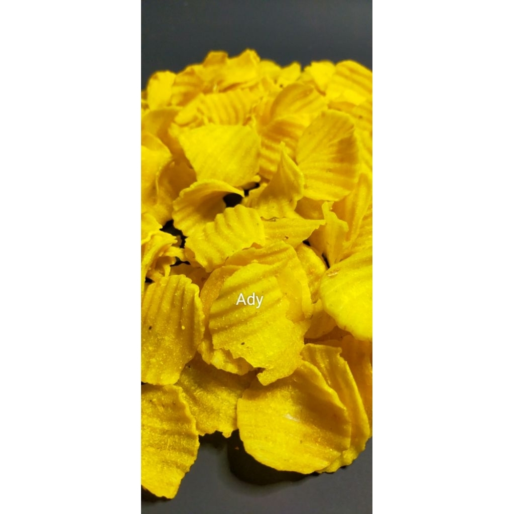 

Kerupuk Puyur Kuning pedas manis ( Mentah ) kemasan 1 kg