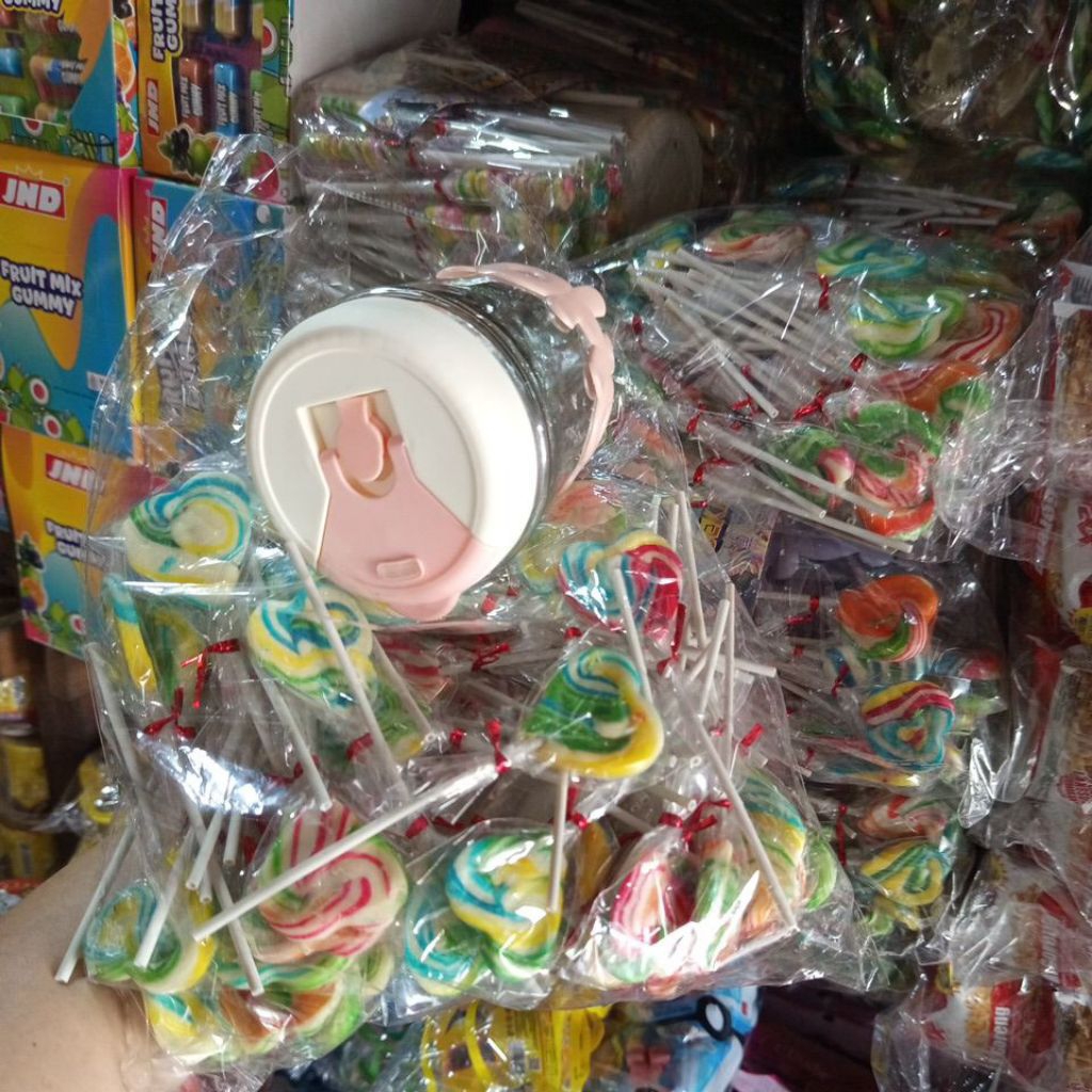 

PERMEN LOLIPOP PITA 60PCS+BONUS TANBER 1BOTOL