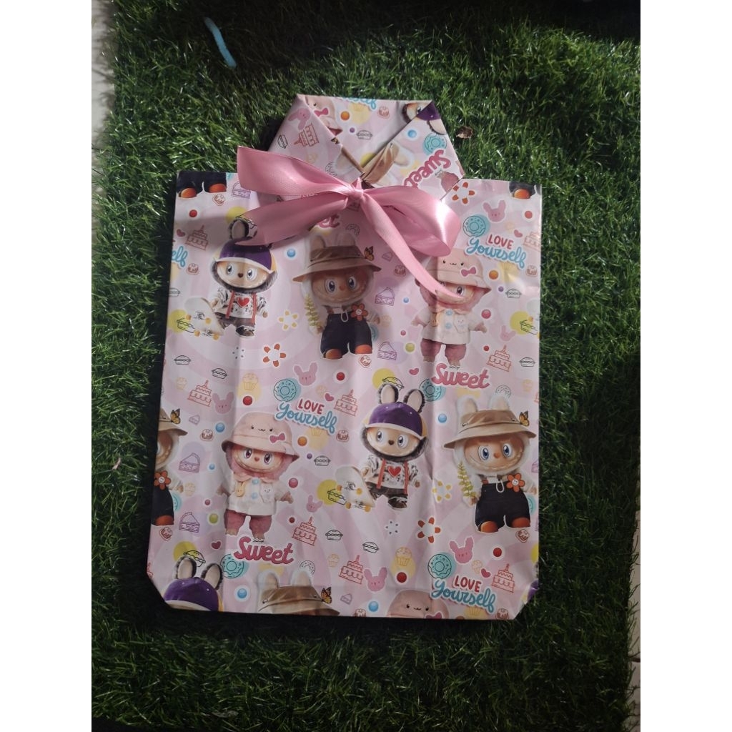 

kertas kado instan model baju ( motif + warna random)