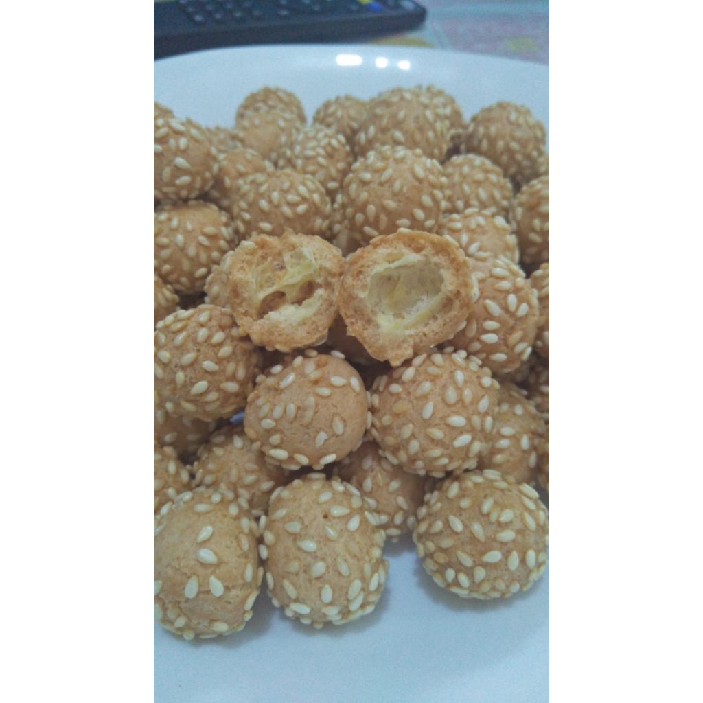 

Keciput Ketan tradisional 200gr, keciput wijen, camilan, cemilan