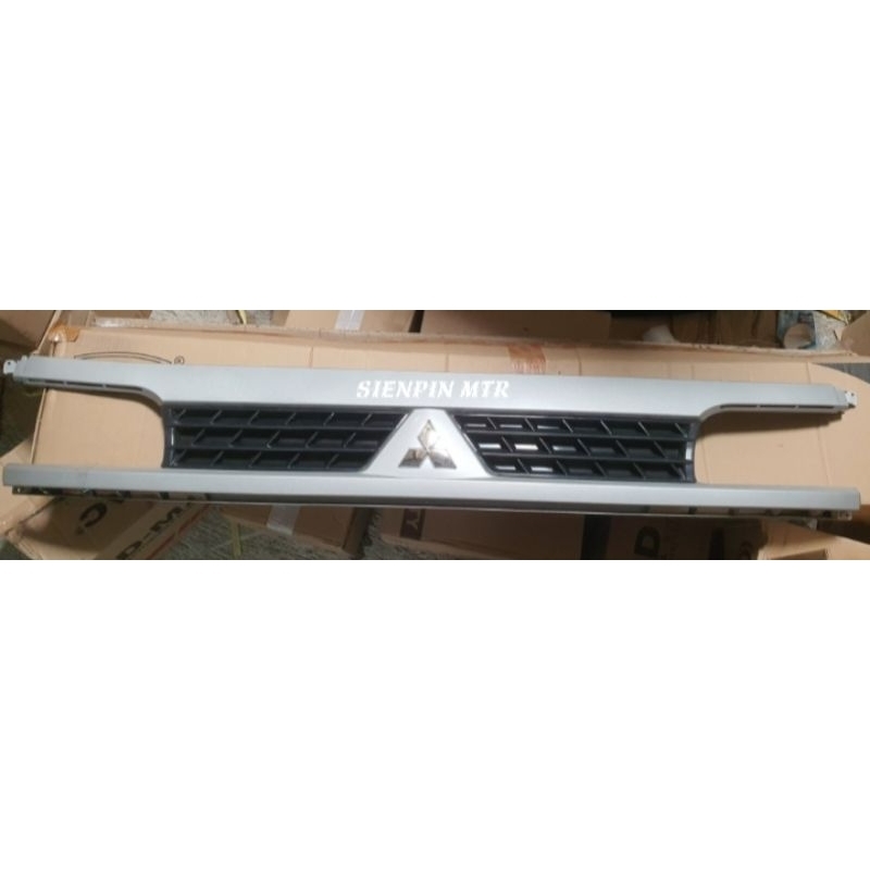 Grill mitsubishi Colt  T120ss logo Crome