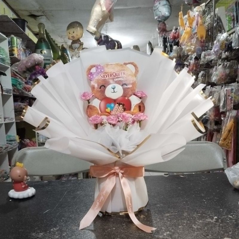 

Bucket coklat beruang pink