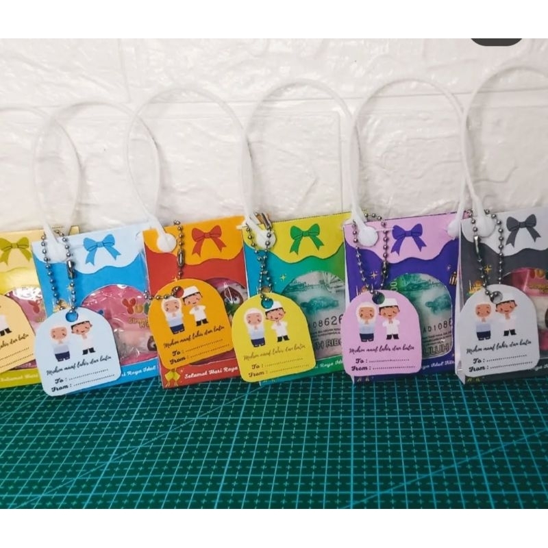 

isi 10 parsel mini amplop lebaran model tas