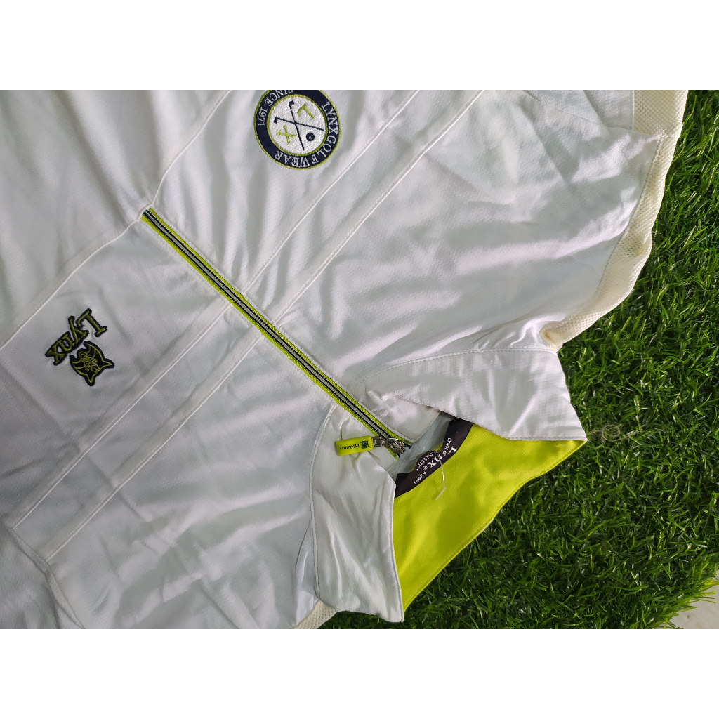 baju golf lynx
