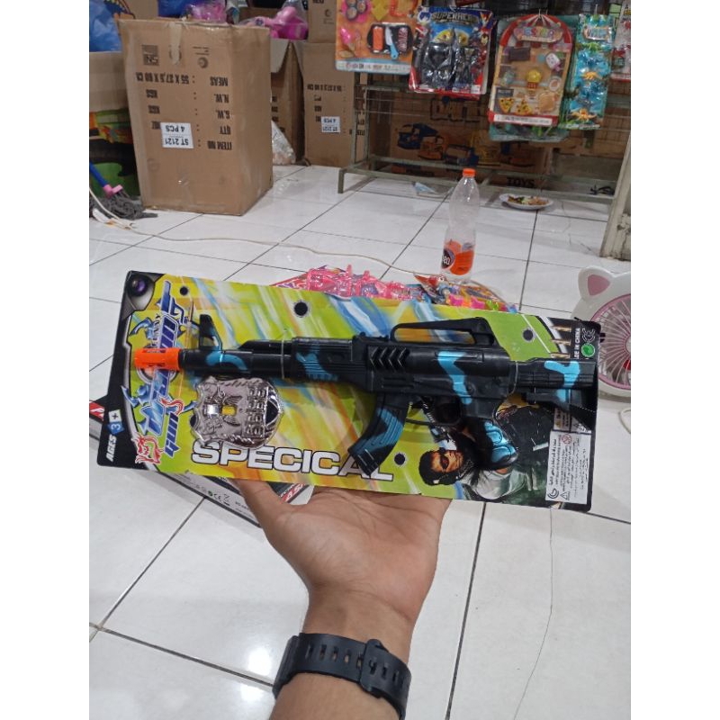 Mainan tembak bunyi tretek + lencana polisi silver Z026 Toy