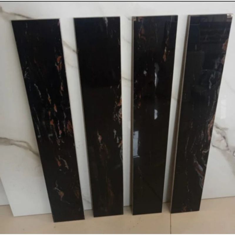 list plint 10x60 cm hitam