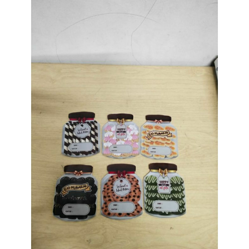 

Amplop Lebaran Motif Toples Kue