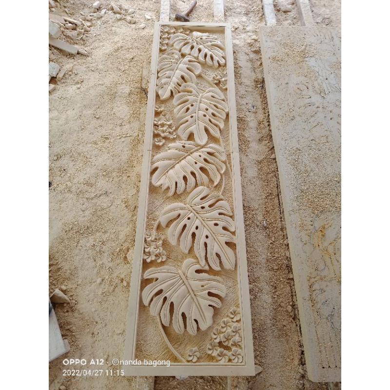 ukiran batu alam hiasan dinding motif bunga