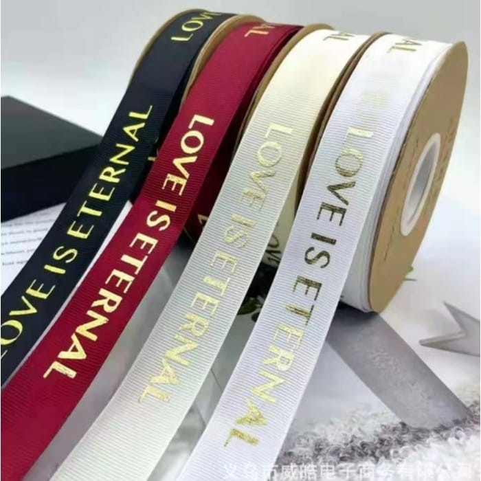 

PITA IMP TULISAN LOVE IS ETERNAL 2.5CM / PITA SATIN / PITA KADO / PITA BUCKET / PITA PER ROLL