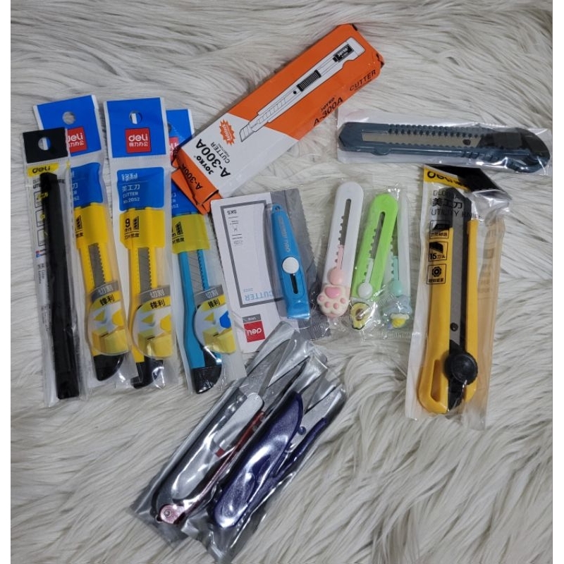 

Cutter pisau pemotong kertas