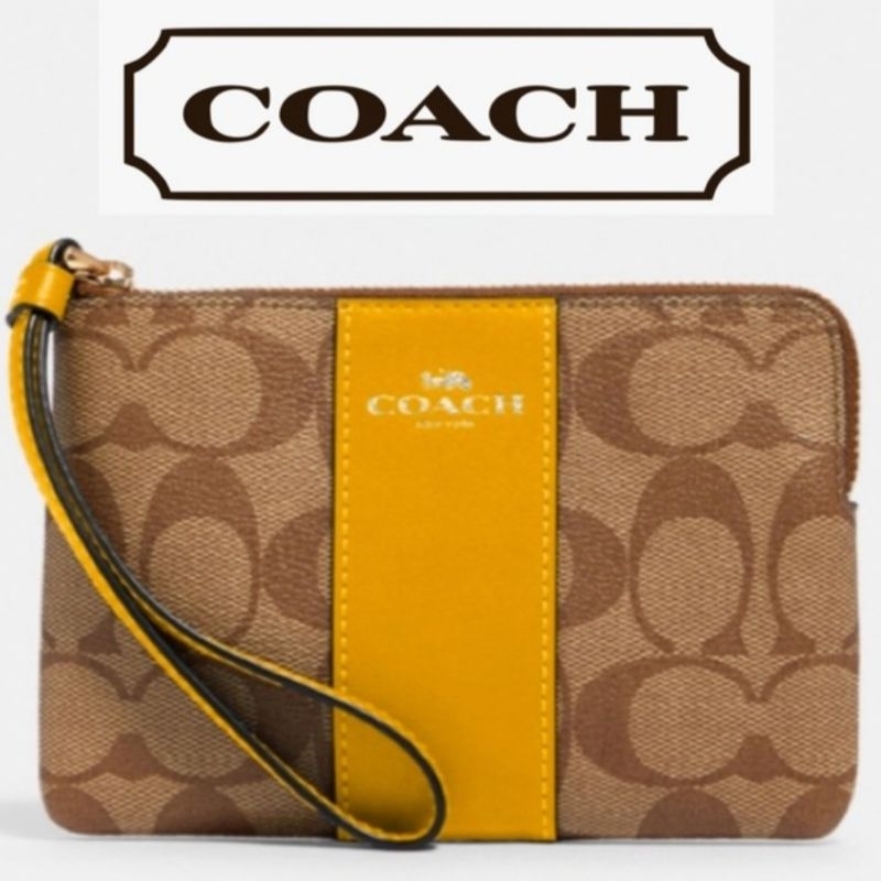 COACH Corner Zip Wristlet in Signature Canvas Authentic (PRELOVED) warna Coklat / Dompet COACH Origi