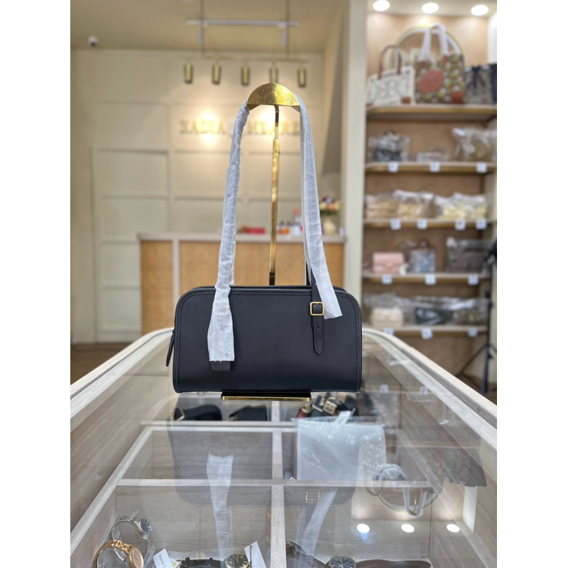 (Nadia Meares Gallery)Coach-Swing Zip