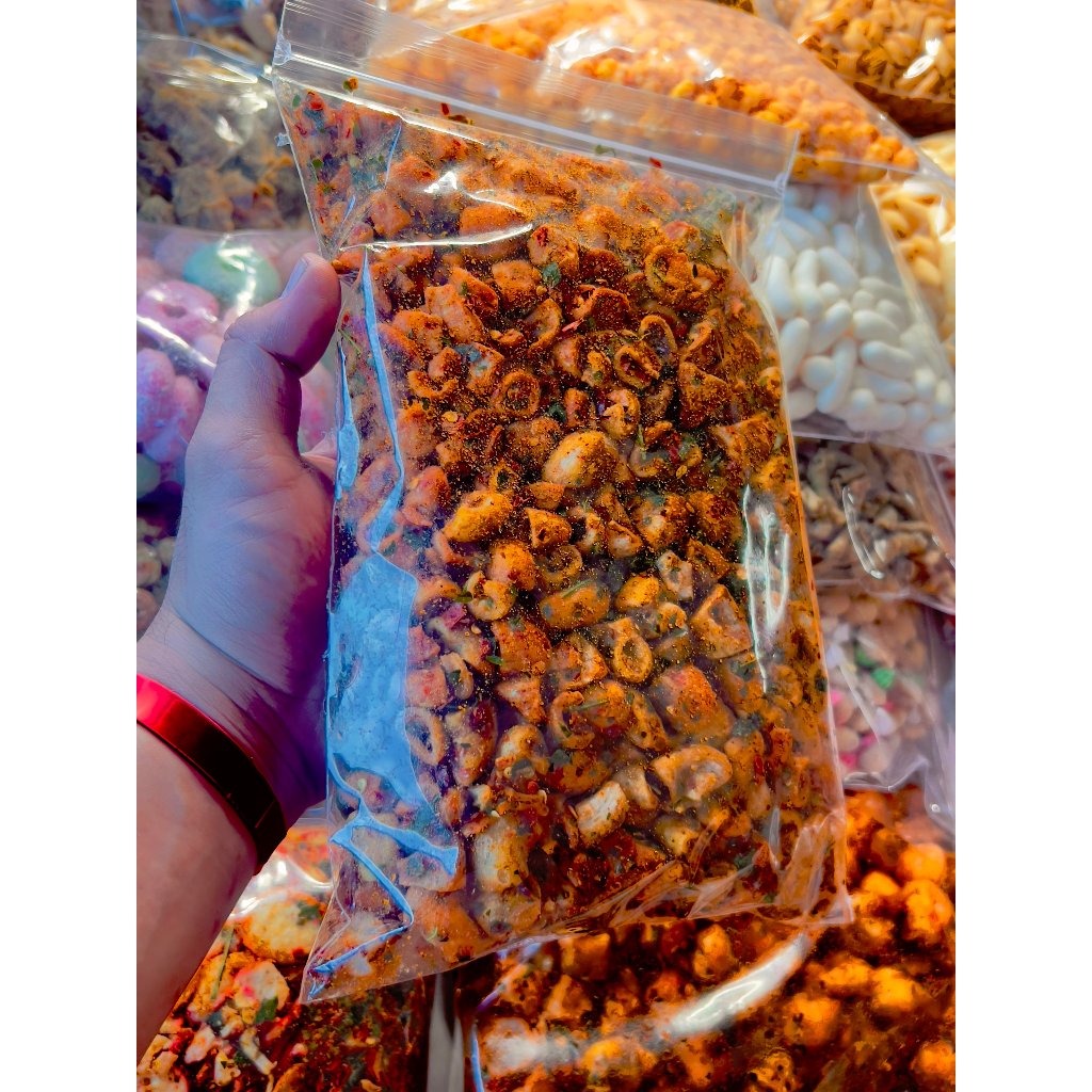 

SOTONG PEDAS DAUN JERUK 500 GRAM CEMILAN CAMILAN PEDAS GURIH ENAK TERLARIS