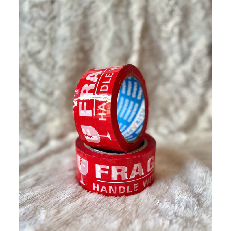 

Lakban Fragile Merah 48 MM X 100 YARD / Lakban Fragile Merah 300 Yard / Lakban Fragile 100 Yard Isolasi Murah