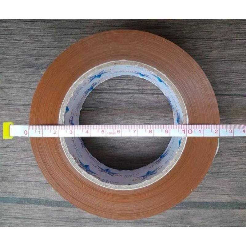 

MAS LAKBAN COKLAT SEVEN STAR JUMBO 45 X 200 YARD PER DUS ISI 54