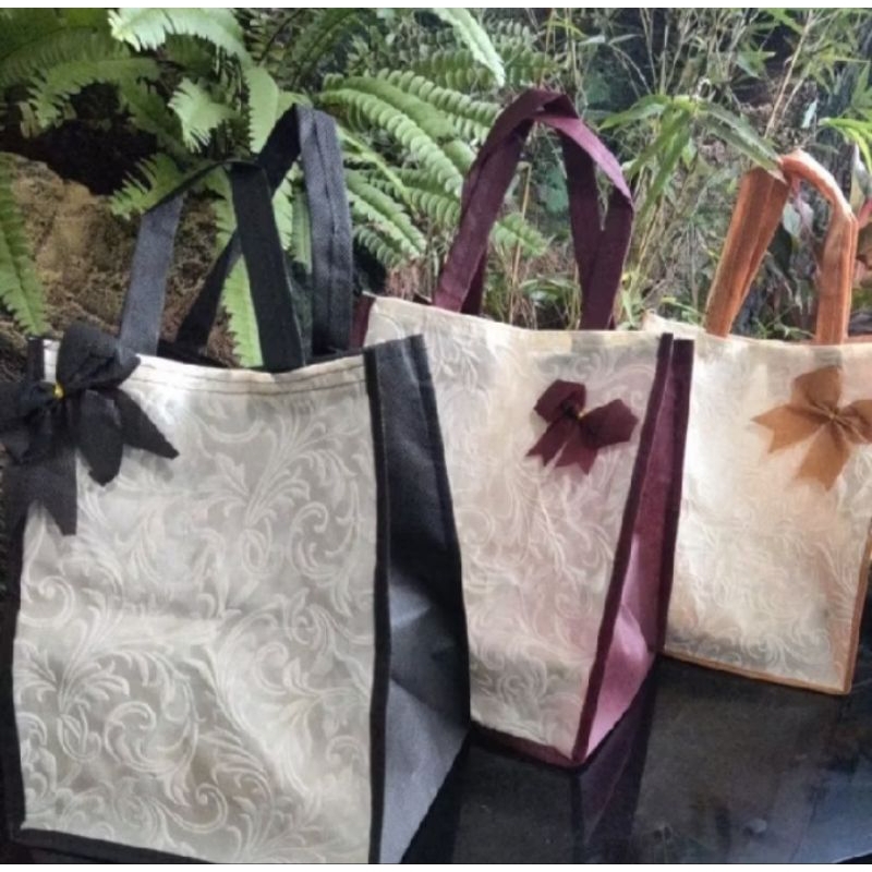 

tas hajatan embos 22 harga per lusin 12 psc