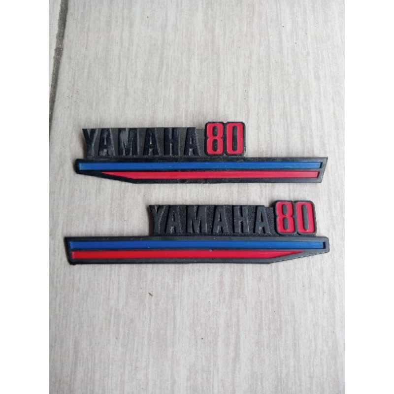 emblem cover belakang yamaha v80 original