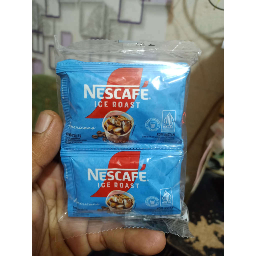 

Kopi NESCAFE ICE ROAST AMERICANO 1 Renceng isi 10 Sachet 2gr