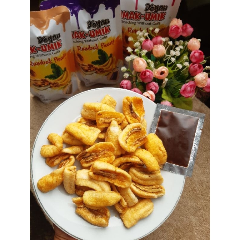 

UMAK-UMIK keripik rambak pisang super free glaze kemasan 80gr snack kriuk,unik, gurih dan 100% pisang Aseli.