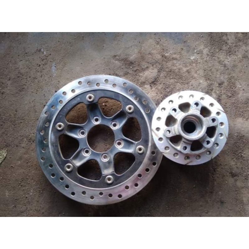 tromol depan tiger revo ori(set piringan)