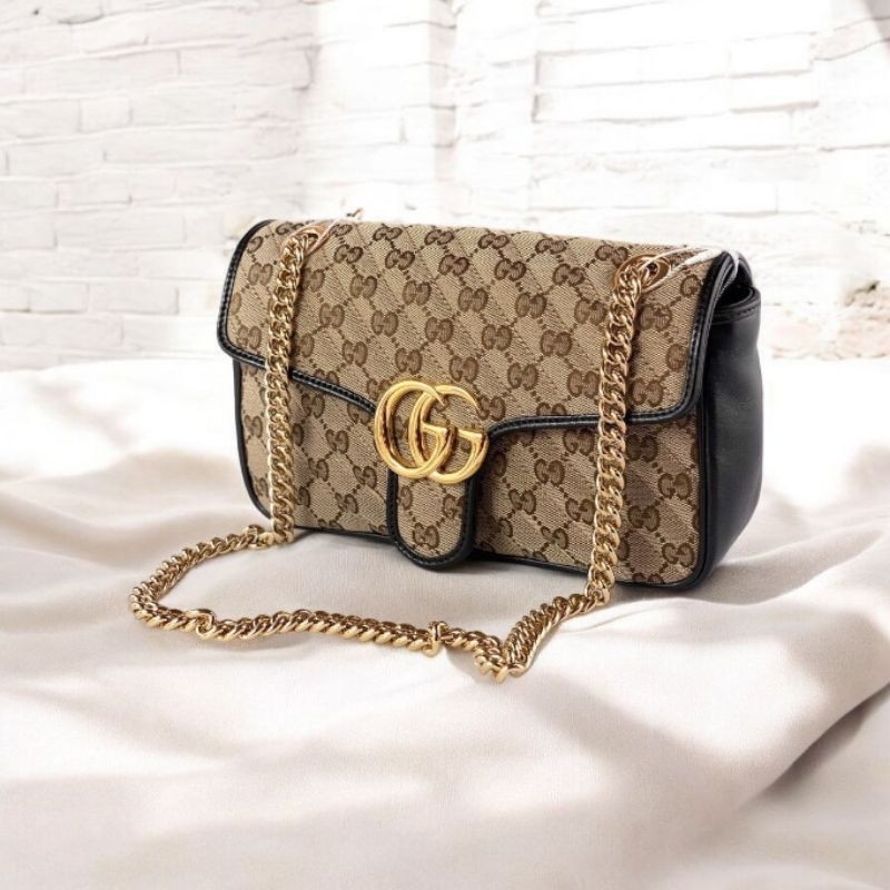 TAS GUCCI
Marmont Mini GG Canvas Shoulder Bag

