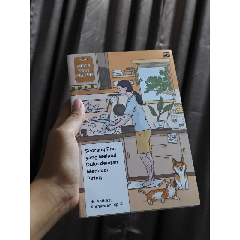 Seorang pria yang melalui duka dengan mencuci piring (preloved)