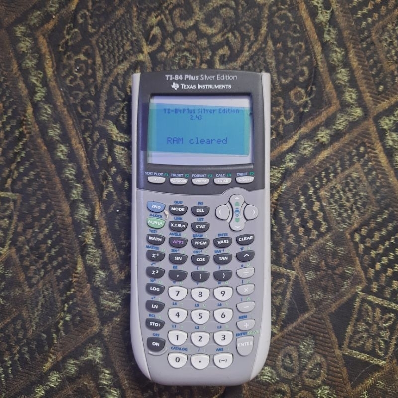 

Texas Instrumens TI-84 Plus Silver Edition graphic Calculator bekas kondisi bahan