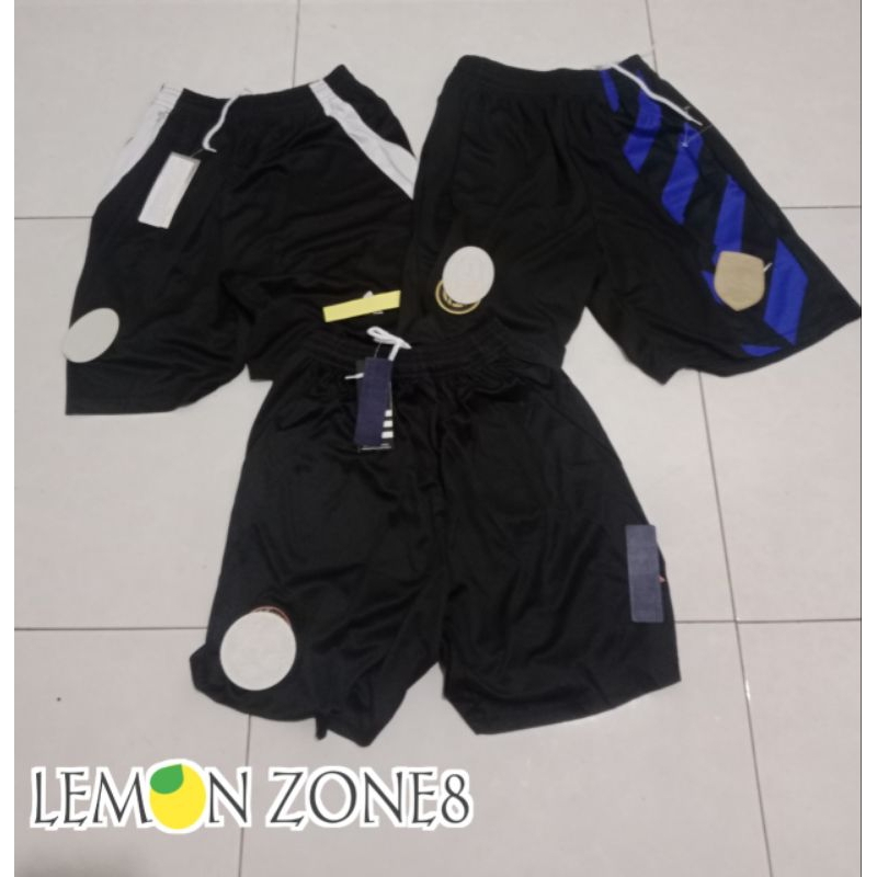 celana pendek klub bola hitam