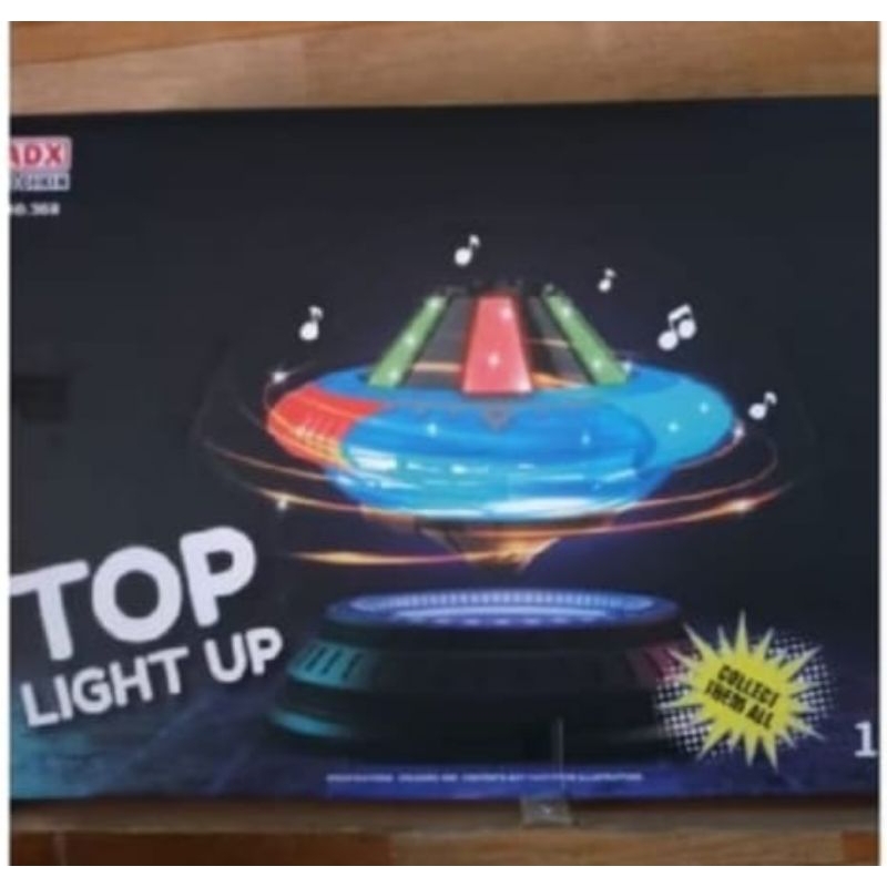 Mainan anak gasing pencet pesawat UFO bisa nyala lampu dan musik keren murah harga satuan perpcs gan