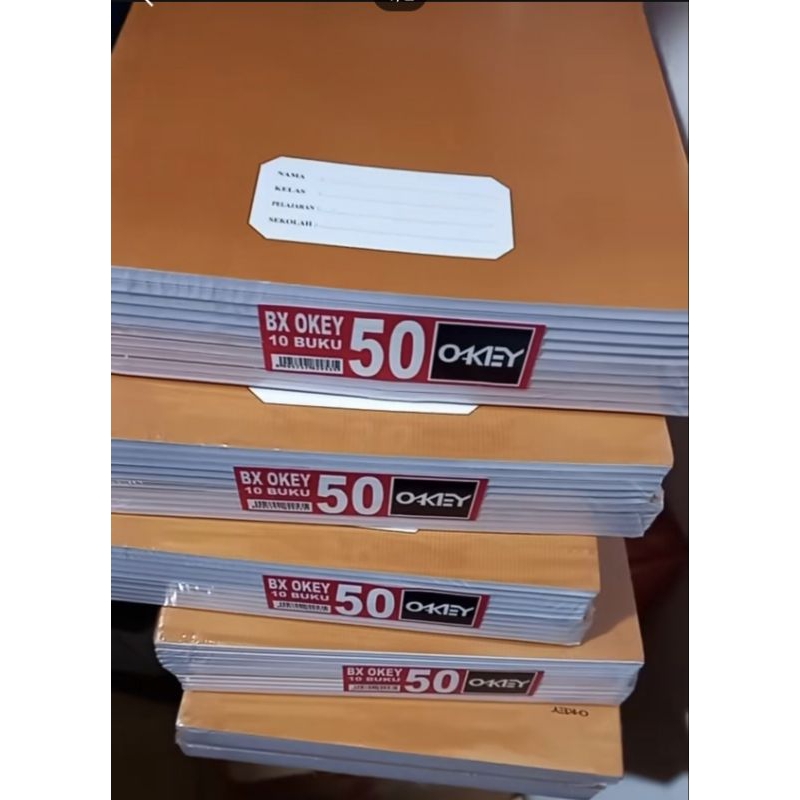

OKEY buku tulis panjang/boxy 50 lembar sampul coklat isi 10 buku