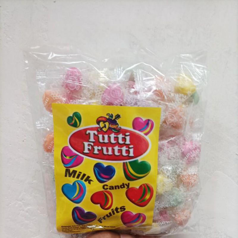 

PERMEN TUTTI FRUTTI 1 BUNGKUS MANISAN JADUL TUTTIFRUTTI TUTI FRUTI BENTUk love kuning