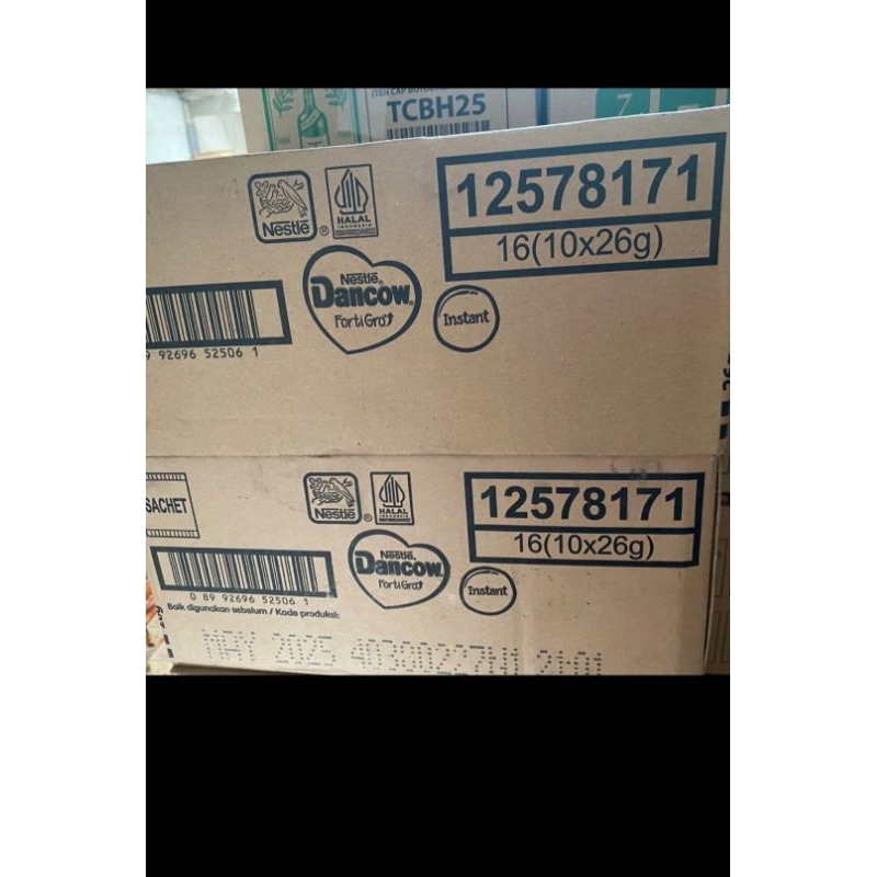 

susu dancow putih dan coklat saset 26 gram
